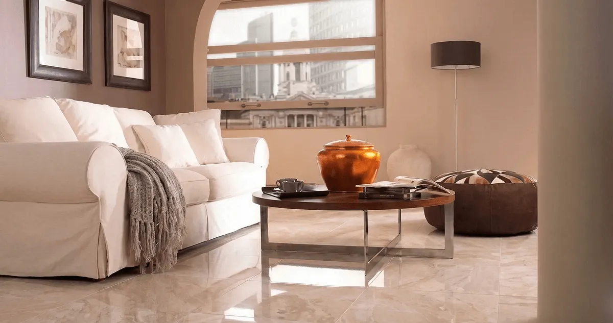 Modern living room with professionally installed marble flooring, a beige sofa, coffee table in Salt Lake City, UT