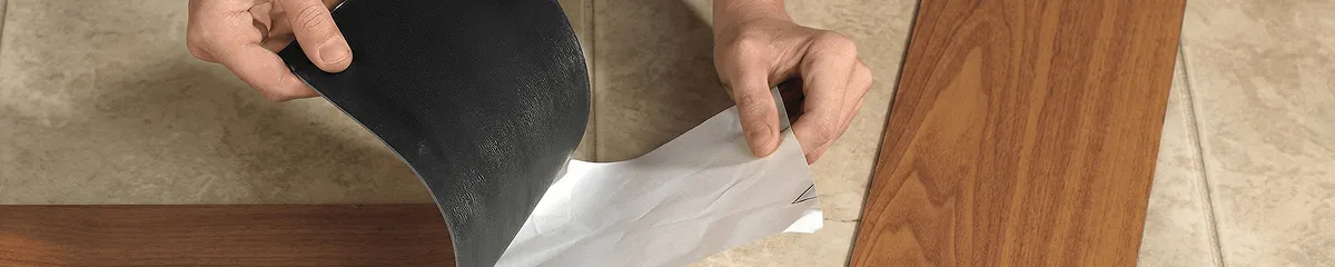 A professional installing vinyl flooring in Salt Lake City, UT